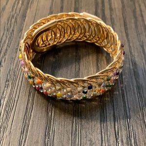 Gold tone wrap around bracelet